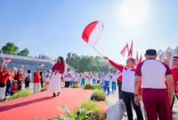 Gerakan Pembagian Bendera Merah Putih Tahun 2025 yang diselenggarakan Pemerintah Provinsi Nusa Tenggara Barat