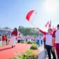Gerakan Pembagian Bendera Merah Putih Tahun 2025 yang diselenggarakan Pemerintah Provinsi Nusa Tenggara Barat